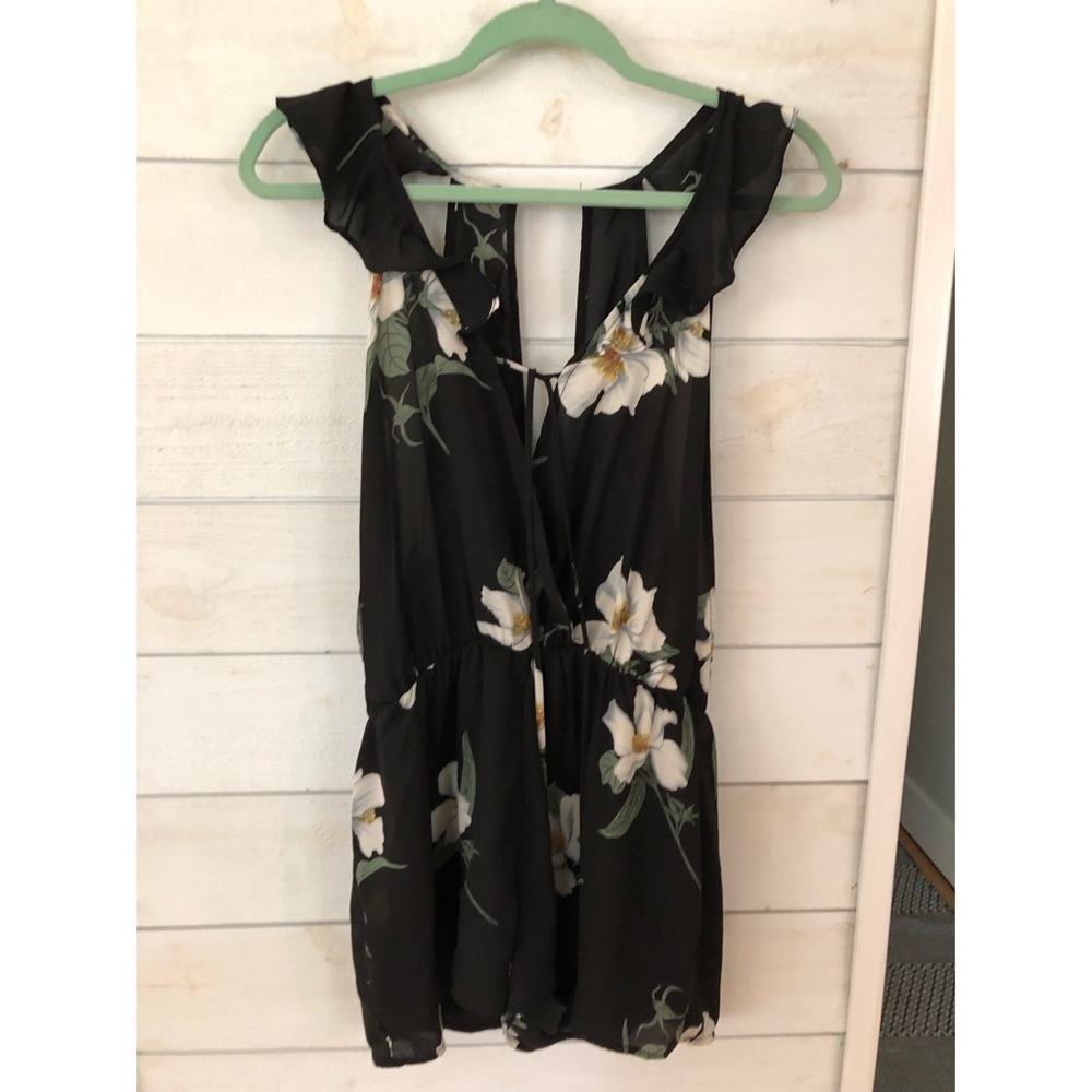 Romper with adjustable ties in front and back